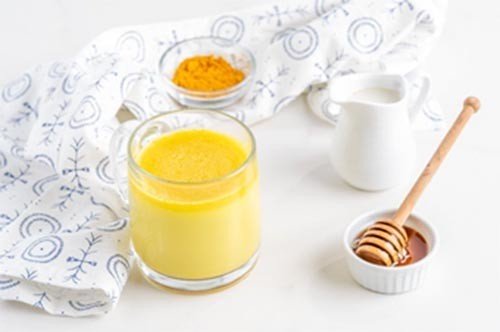 Chữa đau dạ dày bằng nghệ tươi và mật ong